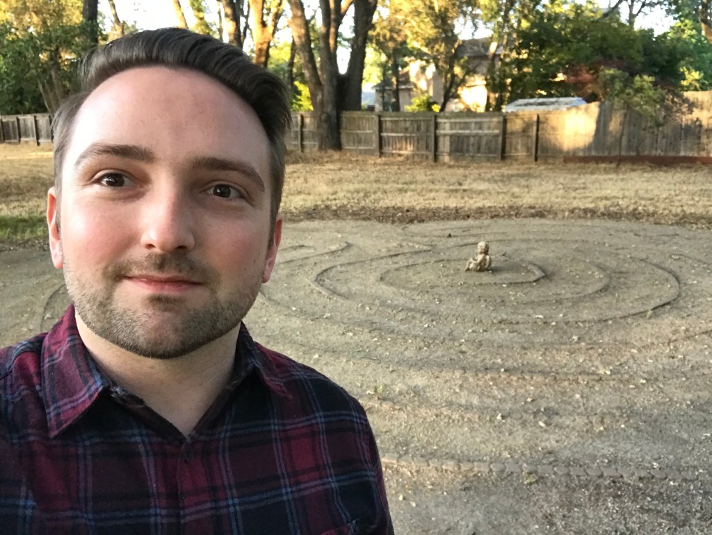 Picture of Nick in front of a prayer labyrinth.