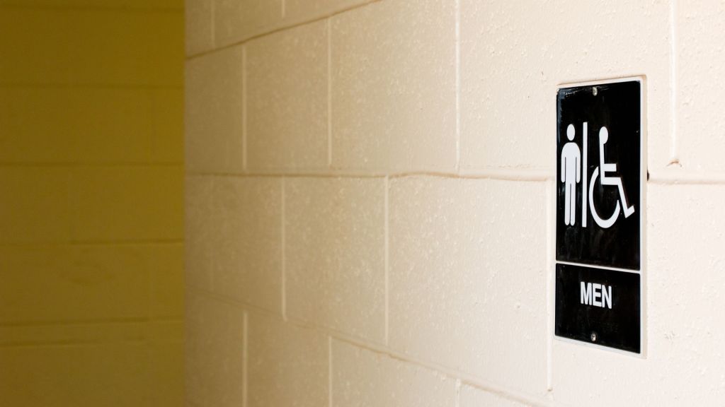 Picture of a men's bathroom sign. 